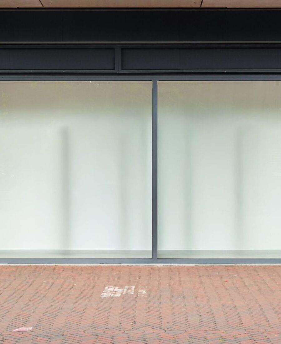 Clean modern storefront with large glass windows